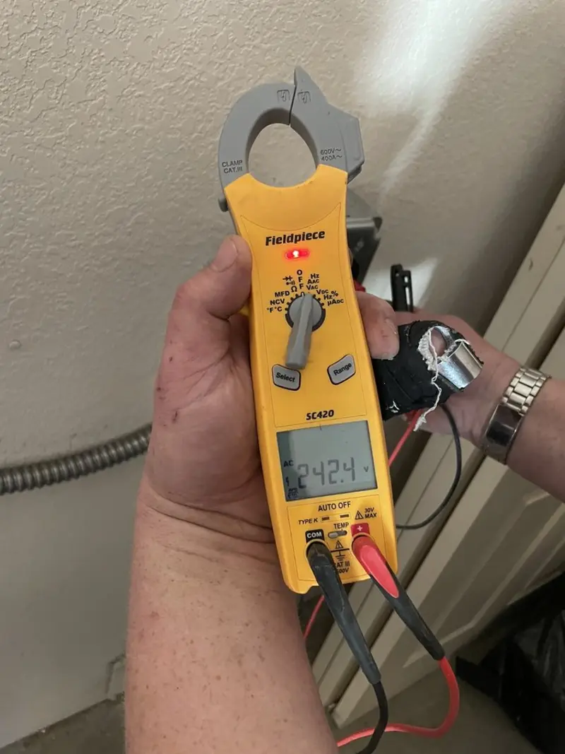 Voltage testing with clamp meter during Aluminum Wiring Replacement in Bethel Park